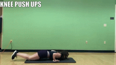 woman demonstrating knee push ups