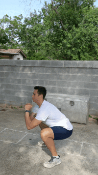 man demonstrating jump squat modification