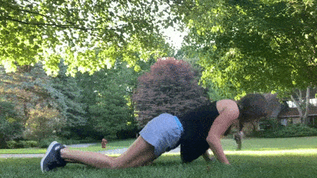 woman demonstrating 3-1 tricep push up modification