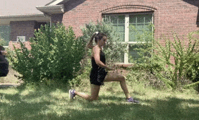 female demonstrating runners lunge