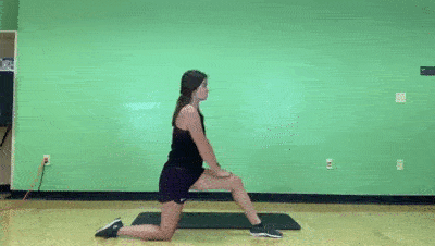 female demonstrating hip flexor stretch