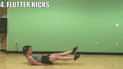 woman demonstrating flutter kicks