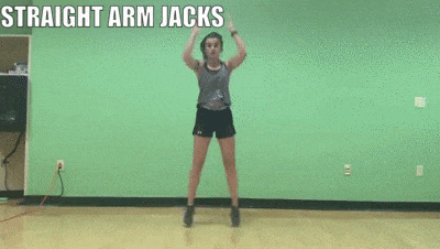 woman demonstrating straight arm jacks