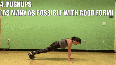 woman demonstrating pushups