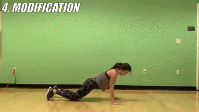 woman demonstrating modified pushups