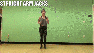 woman demonstrating Straight Arm Jacks