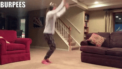 woman demonstrating burpees
