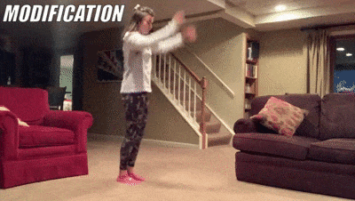 woman demonstrating modified burpees