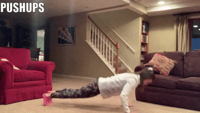 woman demonstrating pushups