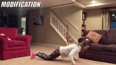 woman demonstrating modified pushups