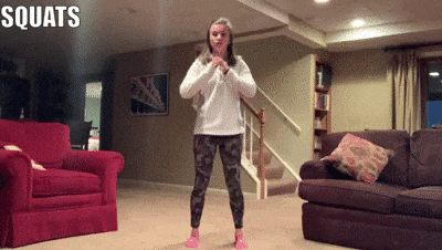 woman demonstrating squats