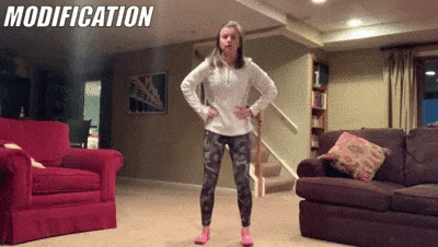 woman demonstrating modified squats