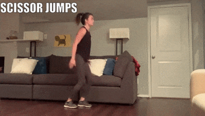 woman demonstrating scissor jumps