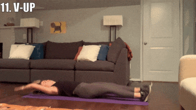 woman demonstrating V-ups