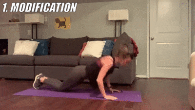 woman demonstrating modified pushups