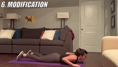 woman demonstrating modified superman burpees