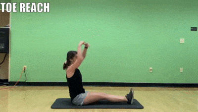 woman demonstrating toe reach