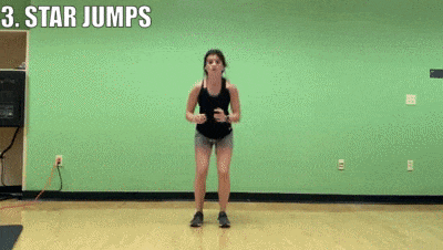 woman demonstrating star jumps