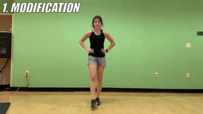 woman demonstrating modified flutter kick squats