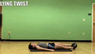 woman demonstrating lying twist