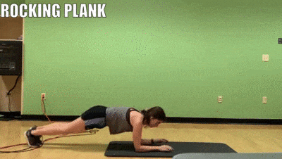 woman demonstrating rocking plank