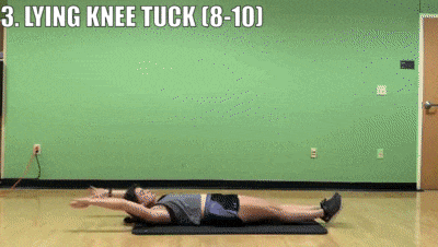 woman demonstrating lying knee tuck