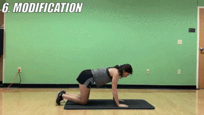 woman demonstrating modified bird dog