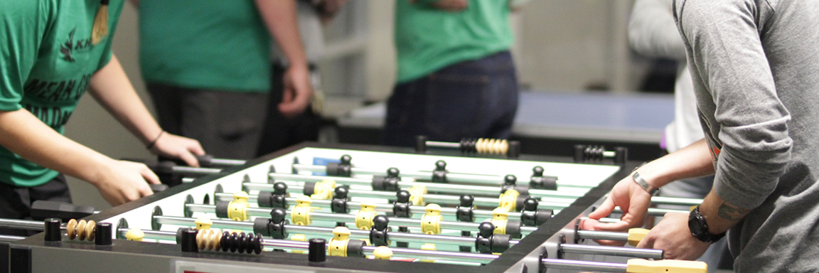 people playing fooseball