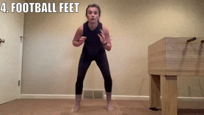 woman demonstrating football feet