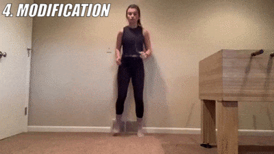 woman demonstrating modified football feet