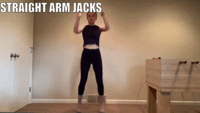 woman demonstrating straight arm jacks