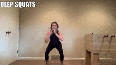 woman demonstrating deep squats