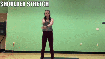 woman demonstrating shoulder stretch
