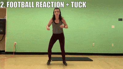 woman demonstrating football reaction and tuck