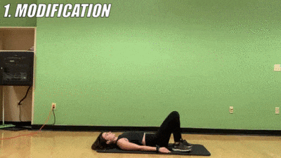 woman demonstrating modified single leg glute lift (right)