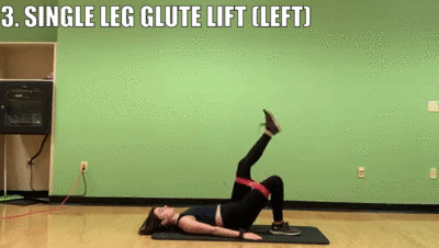 woman demonstrating single leg glute lift (left)
