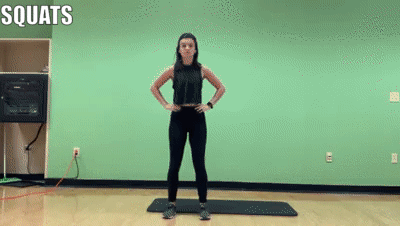 woman demonstrating squats