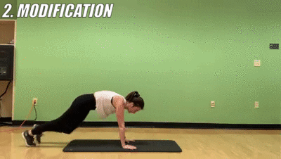 woman demonstrating modified mountain climbers