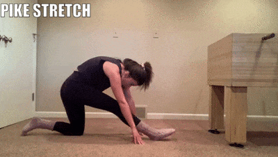woman demonstrating pike stretch