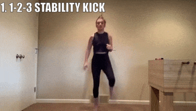 woman demonstrating 1-2-3 stability kicks
