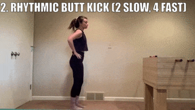 woman demonstrating rhythmic butt kick