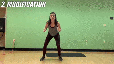 woman demonstrating modified football reaction and tuck