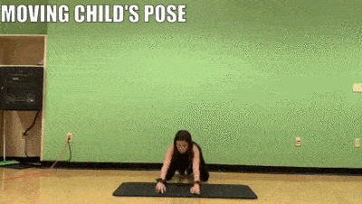 woman demonstrating moving child's pose