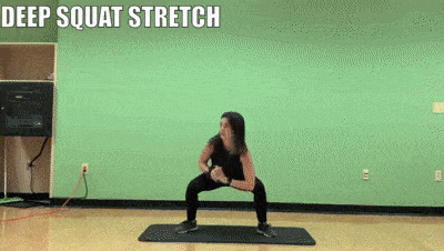 woman demonstrating deep squat stretch