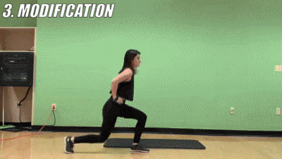 woman demonstrating modified jumping lunges