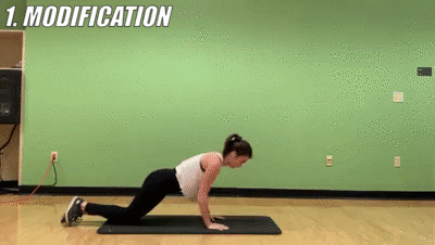 woman demonstrating modified triceps pushups