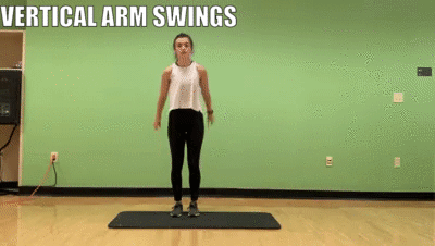 woman demonstrating vertical arm swings