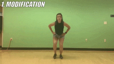 female demonstrating modified wide-to-narrow squat jumps