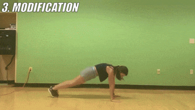 female demonstrating modified 4 mountains + pushup