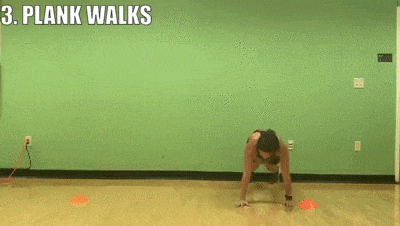 female demonstrating plank walks